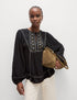 Marks & Spencer "Embroidered Crew Neck Puff Sleeve Blouse"